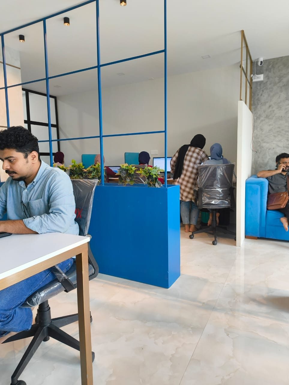 Coworking desks at Loginhub Coworks, Kondotty